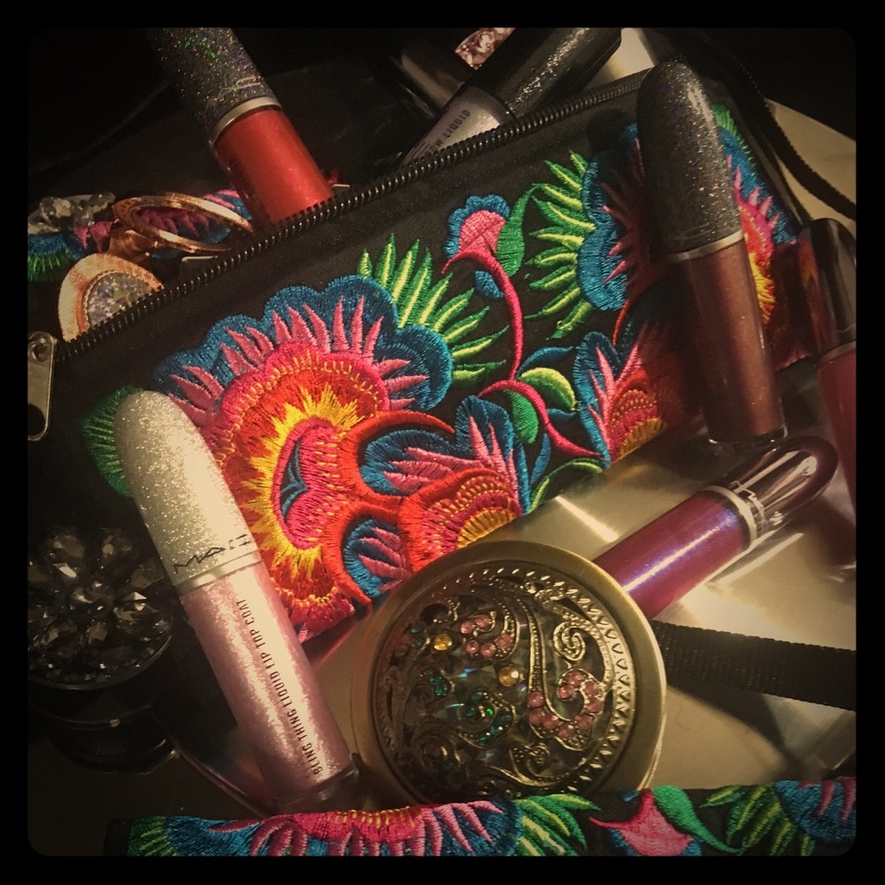 Small black embroidery zip cosmetics clutch